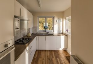 The Newly Built Kitchen With Access To Outdoors