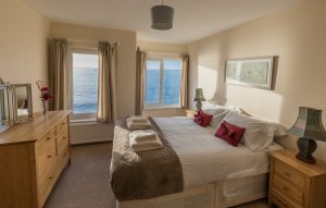 The Master Bedroom With En Suite - And Views Direct Over The Sea