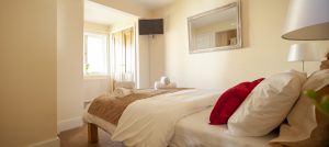 The Master Bedroom Bathed In Natural Light